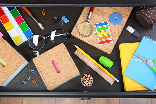 Stationery in open desk