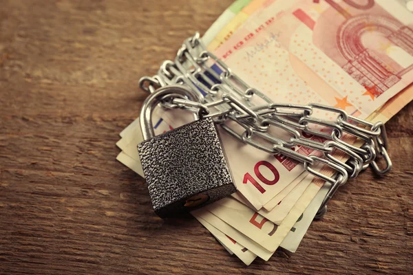 Euro banknotes with lock — Stock Photo, Image