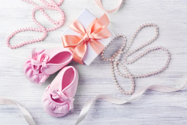 Beautiful composition with baby booties — Stock Photo, Image