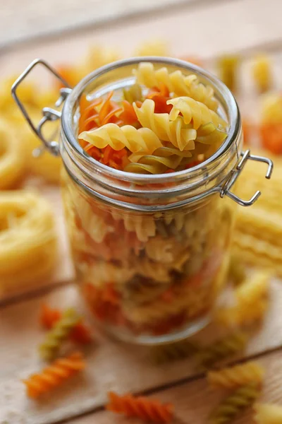 Fusilli pasta in a jar — Stock Photo, Image