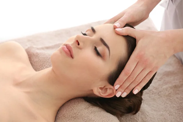 Young woman having massage — Stock Photo, Image