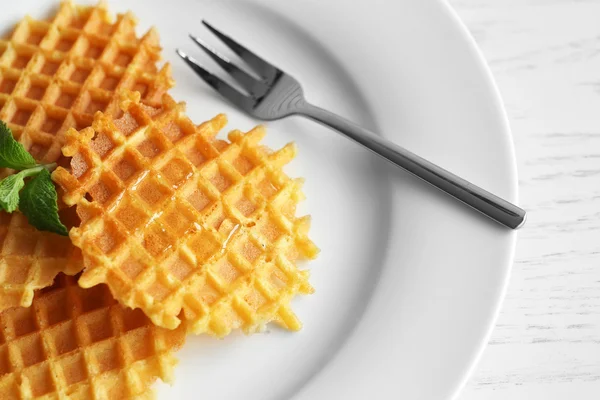 Tasty waffles with honey — Stock Photo, Image