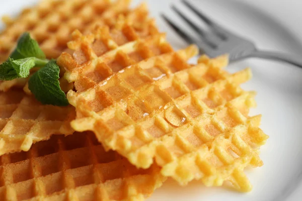 Tasty waffles with honey — Stock Photo, Image