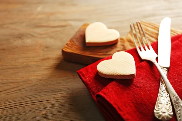 Composition of fork, knife, napkin — Stock Photo, Image