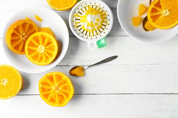 Eating oranges with spoon — Stock Photo, Image