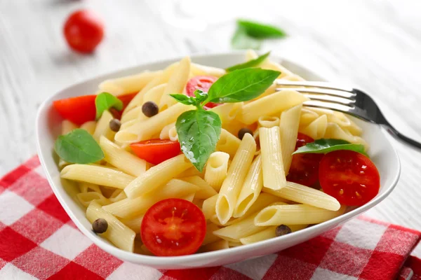 Plate of pasta with cherry tomatoes — Stock Photo, Image