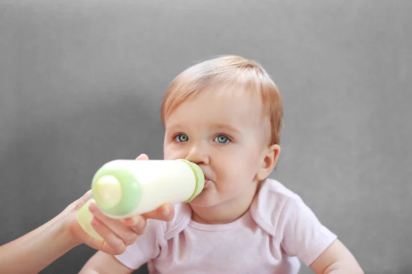 Baby girl drinking milk — Stock Photo, Image