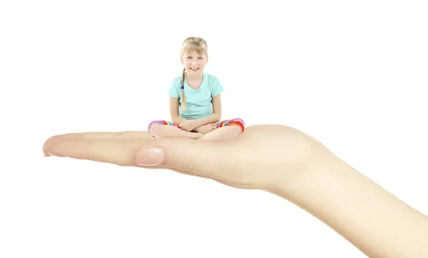 Little girl sitting on hand — Stock Photo, Image