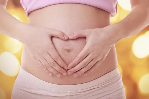 Mujer embarazada de cerca — Foto de Stock