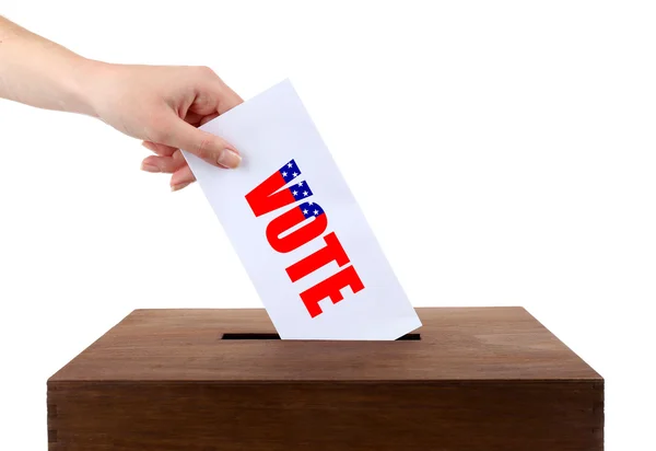 Hand inserting bulletin in ballot box — Stock Photo, Image