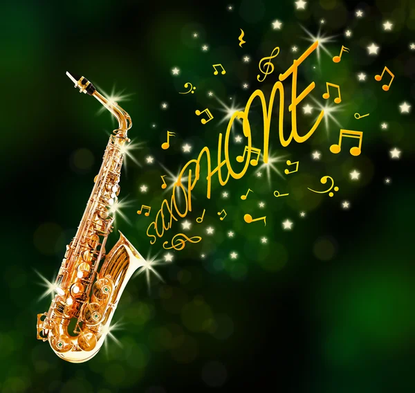 Золотий саксофон і плавні ноти — стокове фото