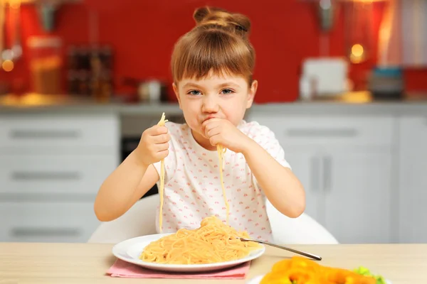 Adorable little girl eating — Stock Photo, Image