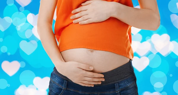 Pregnant woman on  background — Stock Photo, Image