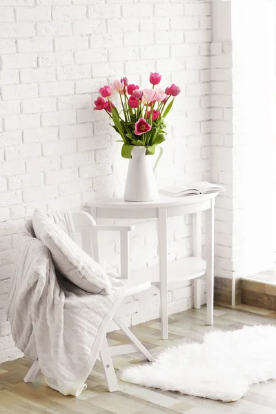 Beautiful tulips on white table — Stock Photo, Image