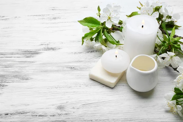 Spa treatment with blooming branch — Stock Photo, Image