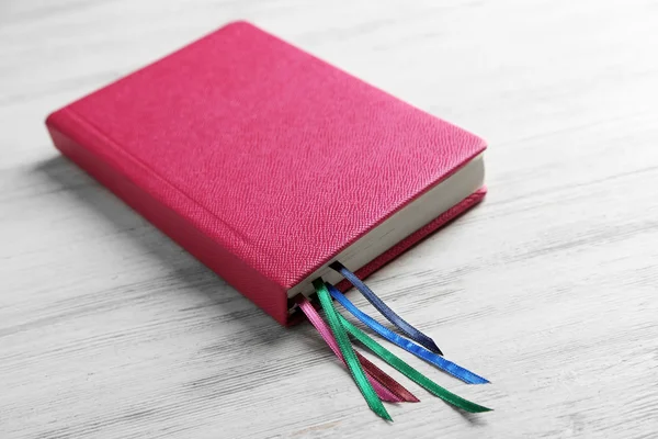 Notebook with bookmarks on  table — Stock Photo, Image