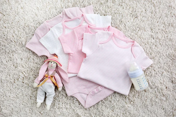 Baby clothes on  background — Stock Photo, Image