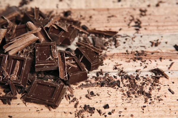 Chocolate pieces on  background — Stock Photo, Image