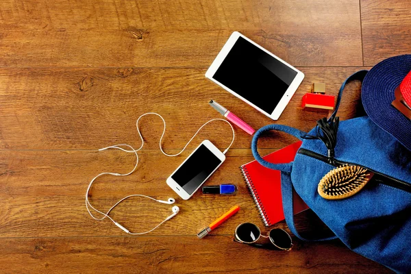 Backpack with gadgets and accessories — Stock Photo, Image