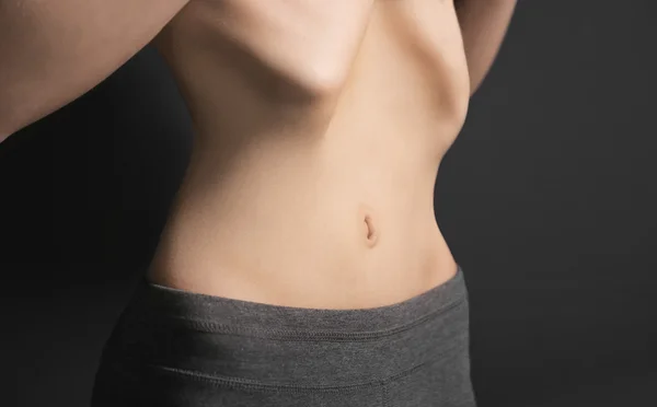 Kvinna med anorexi-mage — Stockfoto