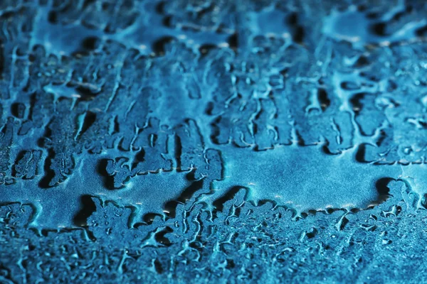 Gotas de agua sobre vidrio azul — Foto de Stock