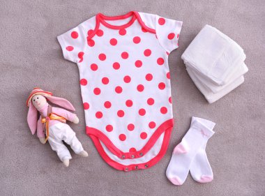 arka plan üzerinde bebek giysileri