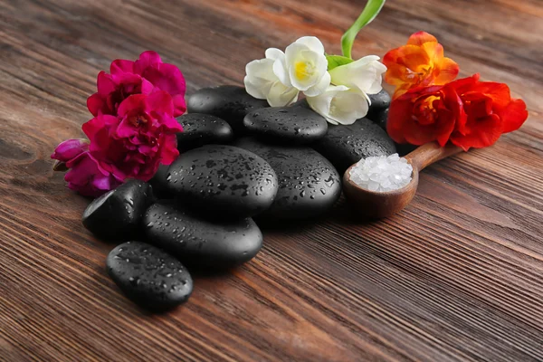Wellness stones met zout op achtergrond — Stockfoto
