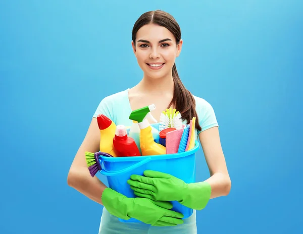 Female cleaner on background — Stock Photo, Image