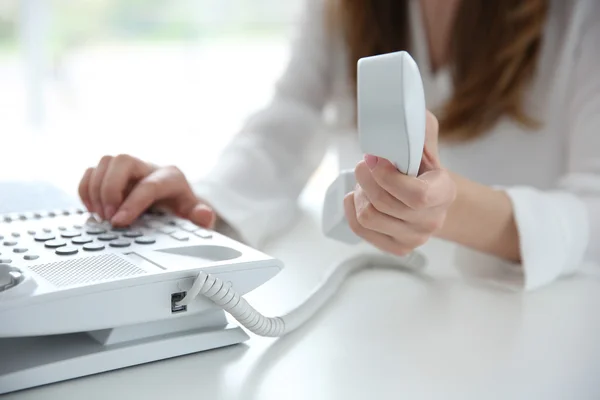 Businesswoman with IP telephone — Stock Photo, Image