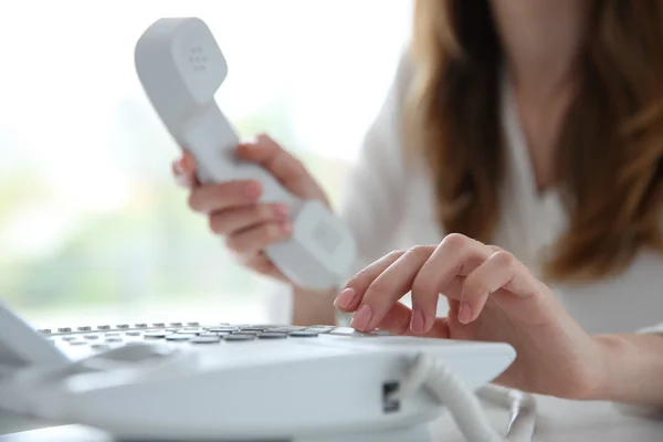 Businesswoman with IP telephone — Stock Photo, Image