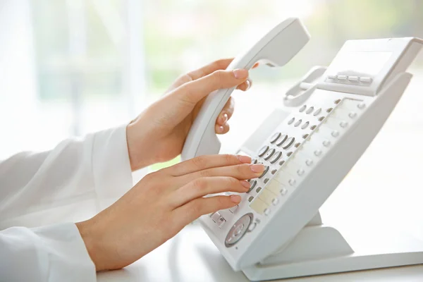 Businesswoman with IP telephone — Stock Photo, Image