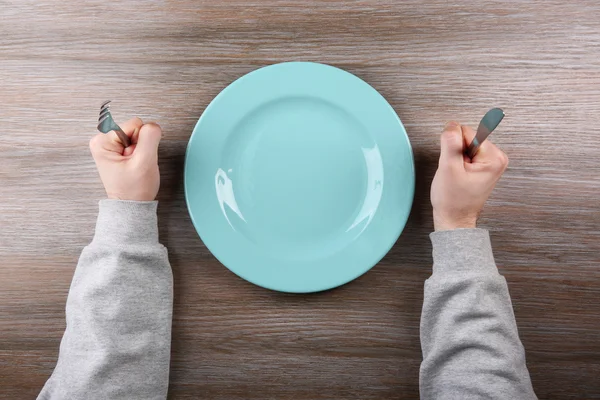 Man with empty plate. — Stock Photo, Image