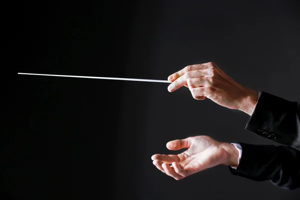 Orchestra conductor hands — Stock Photo, Image