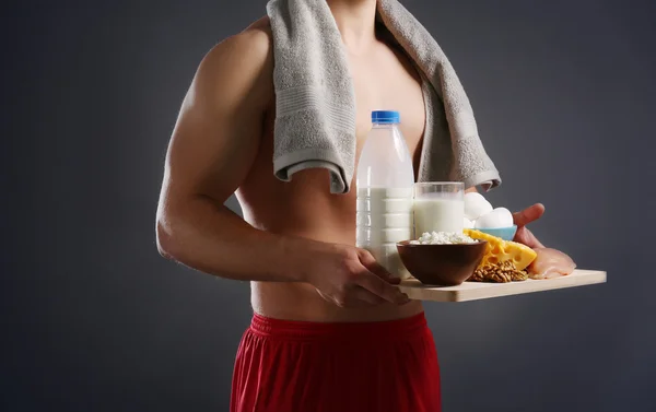 Young man with healthy food — Stock Photo, Image