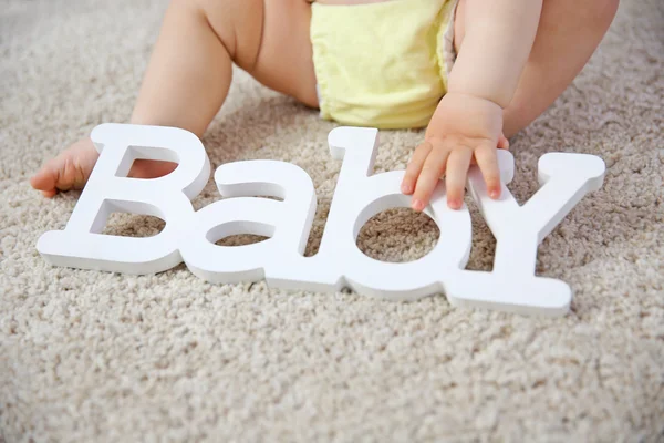 Baby and decorative word — Stock Photo, Image