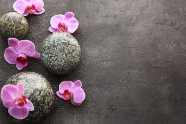 Spa taşlar ve orkide