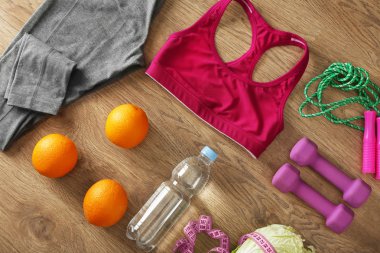 Kadın giyim ile Spor donatımı 