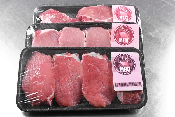 Pedaços embalados de carne de porco — Fotografia de Stock