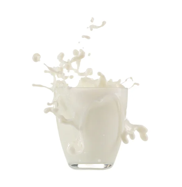 Glass with splashing milk — Stock Photo, Image