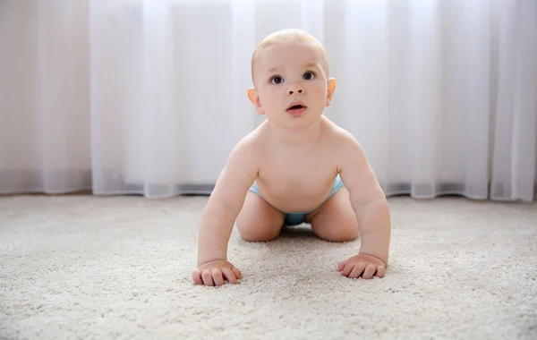 Baby boy on floor — Stock Photo, Image