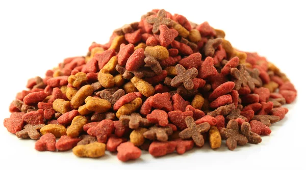 Pilha de comida de cão isolado — Fotografia de Stock