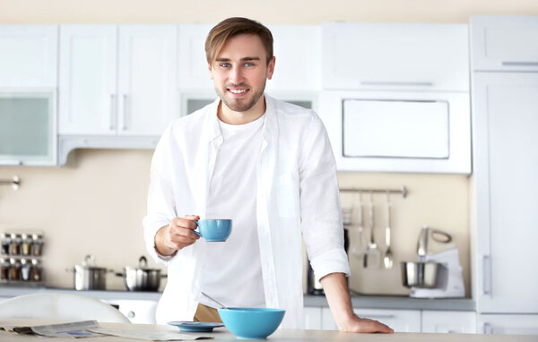 handsome man with cup of coffee