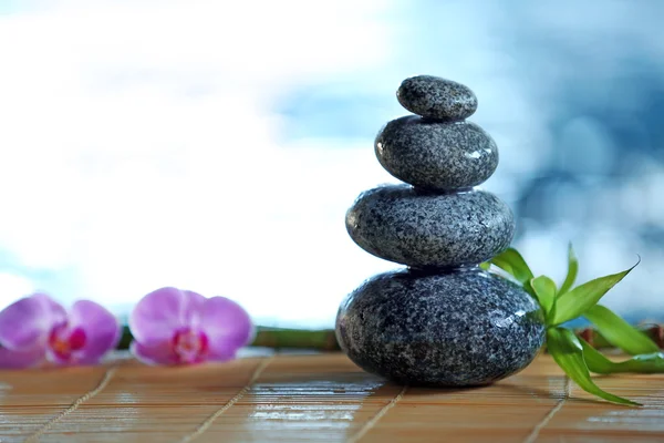 Spa stones and pink orchids — Stock Photo, Image