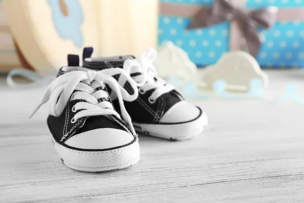 Baby shoes on table — Stock Photo, Image
