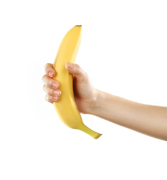 Mano femminile tenendo fresco banana matura — Foto Stock