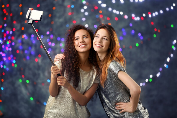 friends taking selfie 