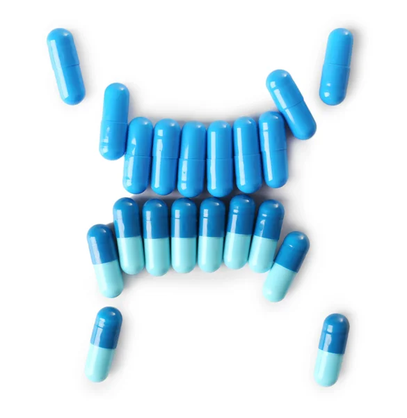 Blauwe pillen op achtergrond — Stockfoto