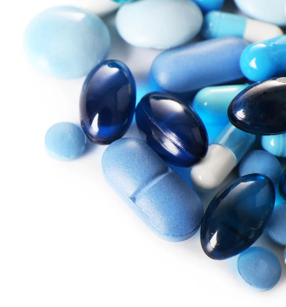 Pilules bleues sur fond — Photo