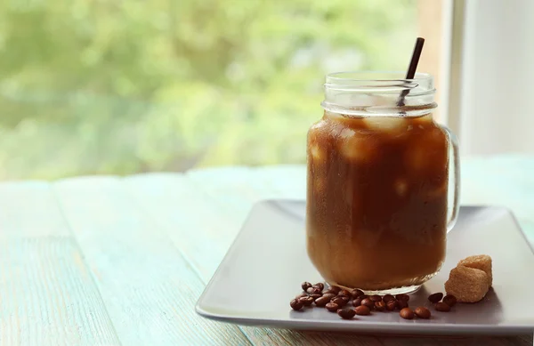 Glass jar of iced coffee — Stock Photo, Image