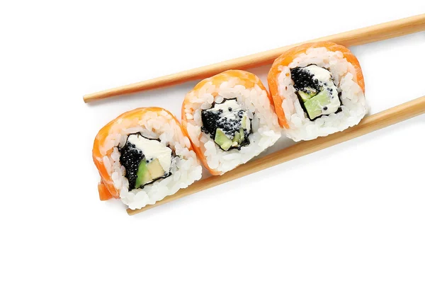 Sushi-Rollen mit Stäbchen — Stockfoto